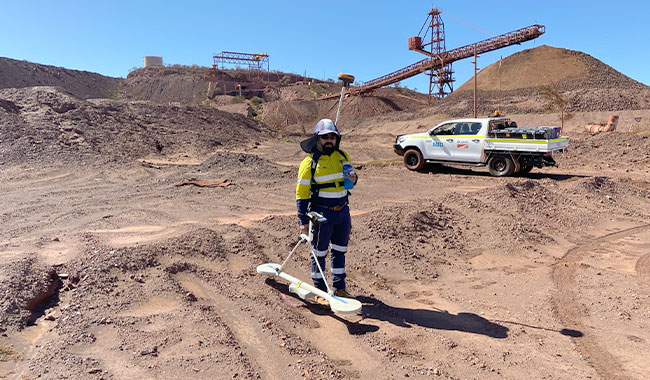 Frequency domain electromagnetics survey equipment in use