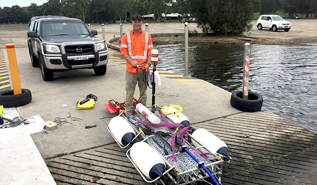 Marine multichannel seismic reflection survey equipment being prepared for deployment